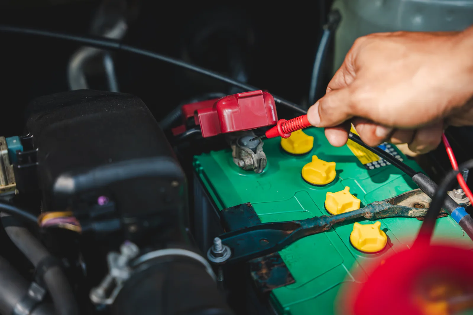 car battery inspection and maintenance in vehicle