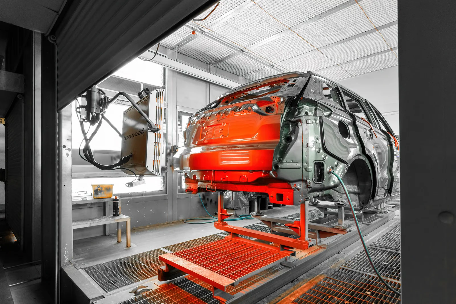 ar painting. modern car assembly plant. red auto