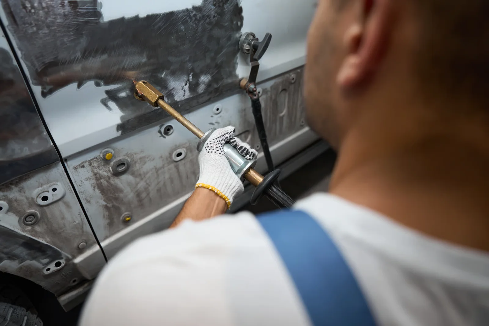 auto body repair using a dent puller