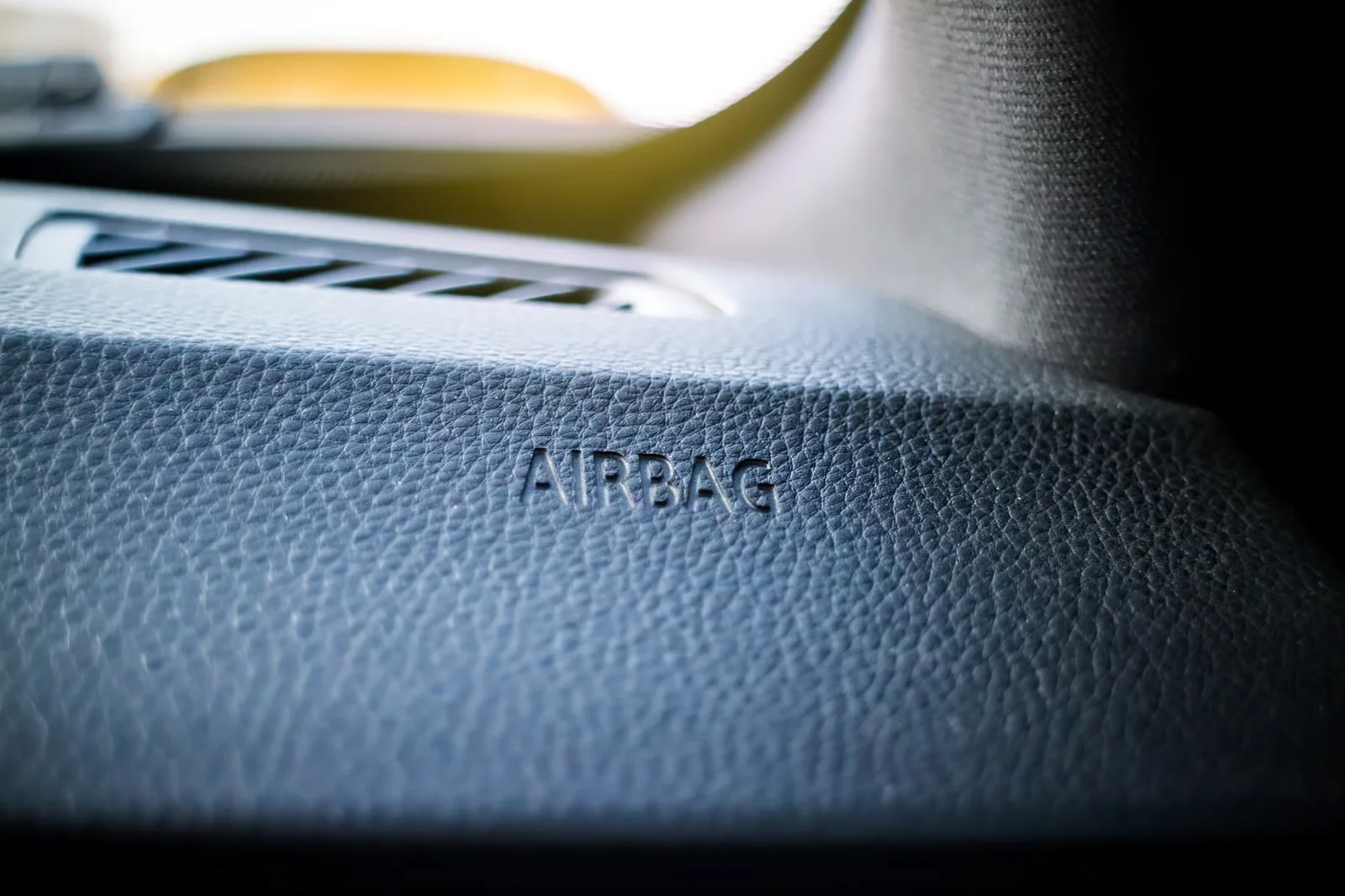 airbag safety detail on car dashboard